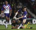 Kevin Sinfield offloads from a Danny Buderus tackle.