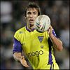 Andrew Johns receives a pass.