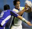 Andrew Johns tries with all his might to spark Warrington.