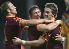 Ben Hornby and Kurt Gidley celebrate Anthony Quinn's matchwinning try.