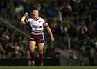 Ben Kennedy celebrates Manly's second try to Michael Robertson.