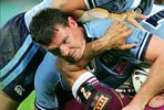 ... Johnathan Thurston to the turf.