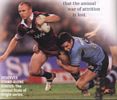 The captains collide as Danny Buderus takes down Darren Lockyer.