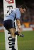 Danny Buderus cleans his boots.