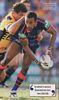 Milton Thaiday dummies to slip a pass ...