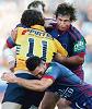 Andrew Johns and George Carmont shut down Nathan Hindmarsh.