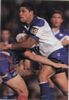Willie Mason tries to push off a Newcastle tackler.