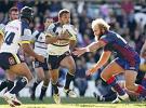 Matthew Bowen evades Kirk Reynoldson with a step ...