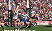 David Seage crosses for a try - reverse view.