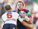 ... makes some heavy contact with Darren Lockyer.