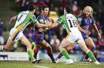 Andrew Johns tries to find a gap.