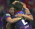 Brian Carney hugs Kurt and Matthew Gidley after scoring try number three!