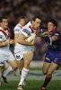 Colin Best fends off Kurt Gidley.