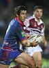 Andrew Johns thinks about passing ...