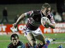 Matt Orford beats Andrew Johns to make a break.