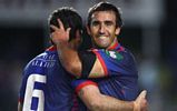 ... Jarrod Mullen and Andrew Johns celebrate the win.