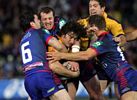 Nathan Hindmarsh is latched onto by Jarrod Mullen, Clint Newton and Reegan Tanner.
