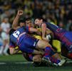 Fuifui Moimoi gets smashed by Jarrod Mullen and Steve Simpson.