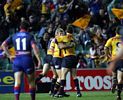 ... and the instigator of the try, Glenn Morrison, settles for a hug.