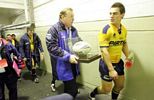 A Parramatta official heads out with the match ball, for presentation to Andrew Johns ...