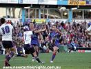 Andrew Johns hoists a bomb to the corner.