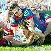... forces the ball for a try.