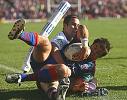 Brian Carney is forced over the dead-ball line.