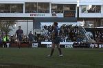 Andrew Johns and Danny Buderus wait for play to resume.