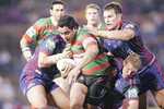 Joe Galavao is swamped by Knights defence.