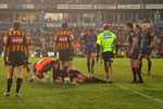 Josh Perry is tackled high ...