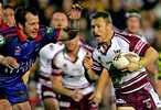 Matt Orford gets past Clint Newton ...