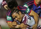 Steve Matai is no match for the defensive prowess of Brian Carney.