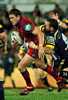Matthew Gidley busts through a tackle.
