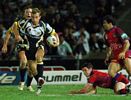... but he skips away from the tackle of Danny Buderus.
