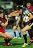 Gavin Cooper pushes off Matthew Gidley.