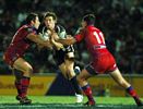 Ashley Graham tries to find space between Adam Woolnough and Steve Simpson.