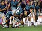 Josh Perry breaks out of a tackle to score the penultimate try.