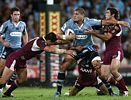 Danny Buderus waits for a potential Willie Mason offload.