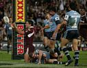 Steve Price celebrates his try ...