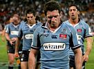 Dann Buderus leads New South Wales off.