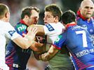 Josh Morris can't get past Clint Newton and Jarrod Mullen.