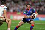 Kurt Gidley puts the step on the Dragons.