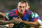 Cory Paterson takes the ball forward at top pace.