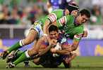 Alan Tongue and Dane Tilse land on top of Brad Tighe (ouch!).