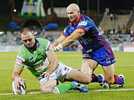 Marshall Chalk gets past Adam MacDougall to post Canberra's first try.