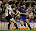 Adam Woolnough takes the ball up.
