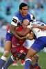 Adam MacDougall is manhandled by Sonny Bill Williams.