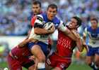 Chris Armit is no show against the defensive prowess of Danny Buderus.