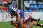 Chris Bailey about to land on a Tiger (ouch).