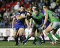 Adam Woolnough finds space up the middle of the Canberra ruck.